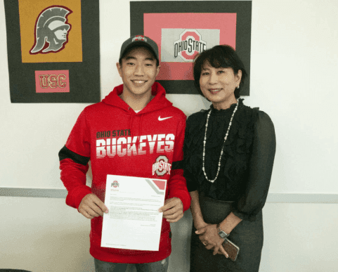 Tomohiro Kawada (class of 2020) with his mother at HBA’s Fall Signing Day. 